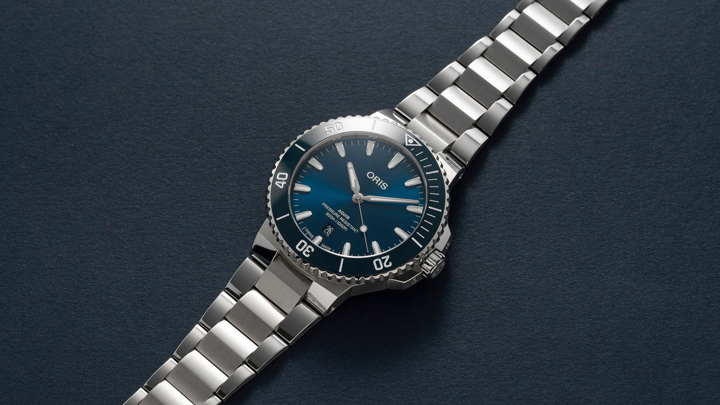 Oris Aquis date